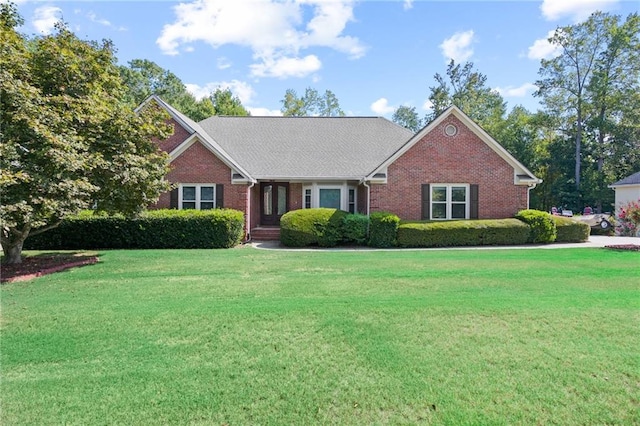 view of front of home featuring a front lawn