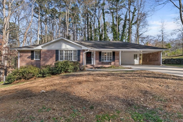 single story home featuring a carport