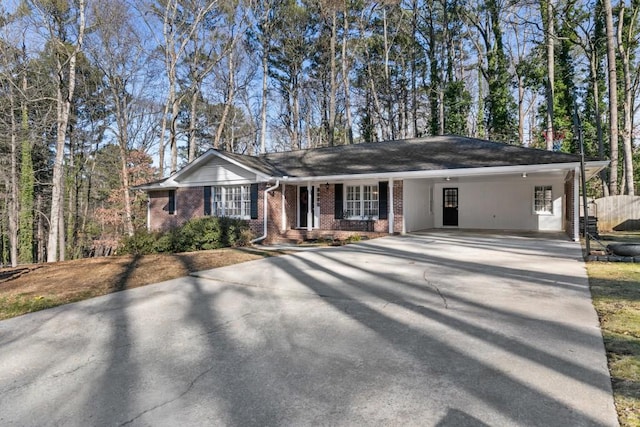 ranch-style home with a carport