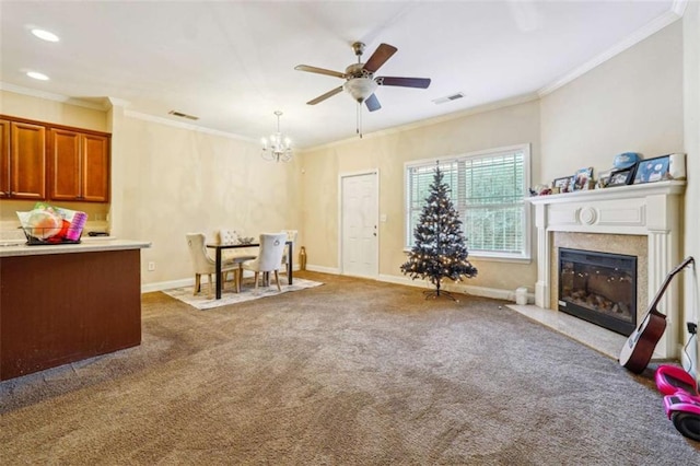2916 Hillside Pl, Decatur, GA 30034 - carpeted living room featuring ceiling fan with notable chandelier, a fireplace, and ornamental molding
