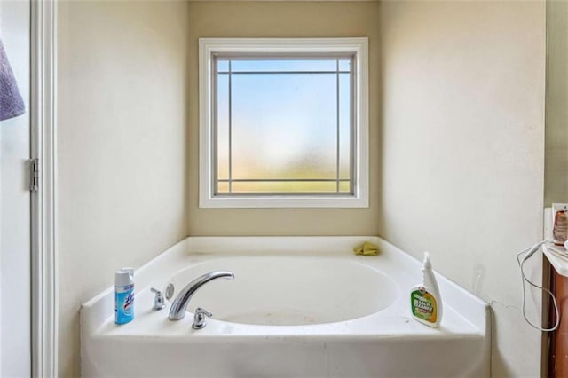 2916 Hillside Pl, Decatur, GA 30034 - bathroom featuring a washtub, vanity, and plenty of natural light