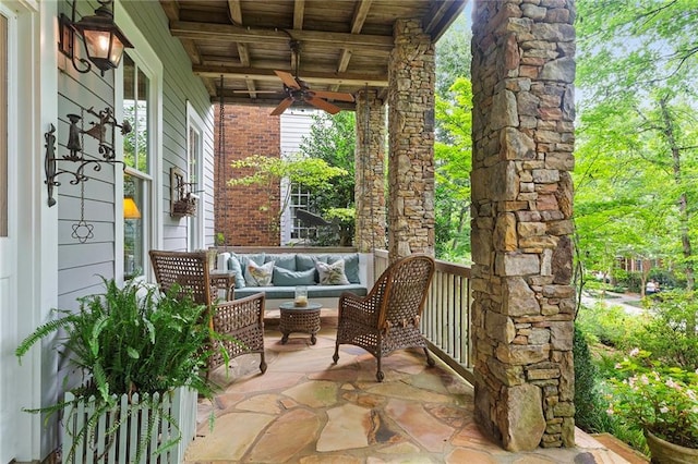 view of patio with a porch, ceiling fan, and an outdoor living space