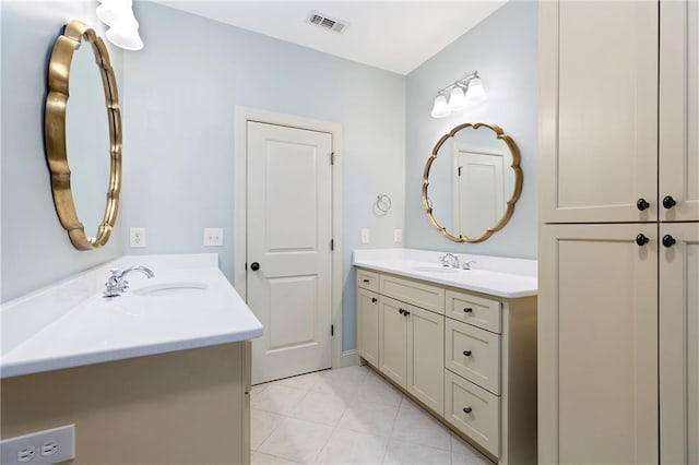 bathroom featuring tile patterned floors and vanity