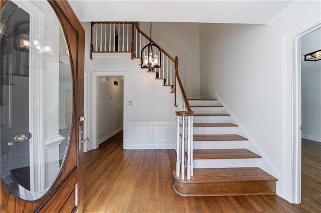 5004 Haralson Way SW, Lilburn, GA 30047 - stairway featuring wood finished floors