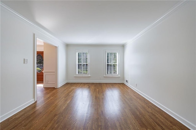 5004 Haralson Way SW, Lilburn, GA 30047 - spare room featuring wood finished floors and ornamental molding
