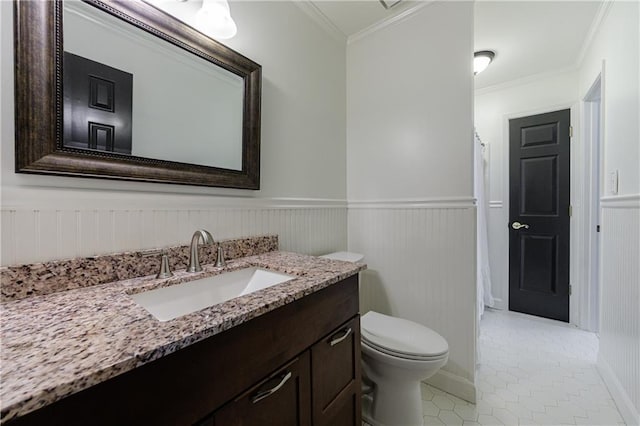 5004 Haralson Way SW, Lilburn, GA 30047 - full bathroom featuring vanity, crown molding, tile patterned flooring, wainscoting, and a shower with curtain