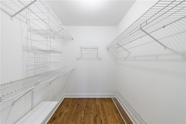 5004 Haralson Way SW, Lilburn, GA 30047 - spacious closet featuring wood finished floors