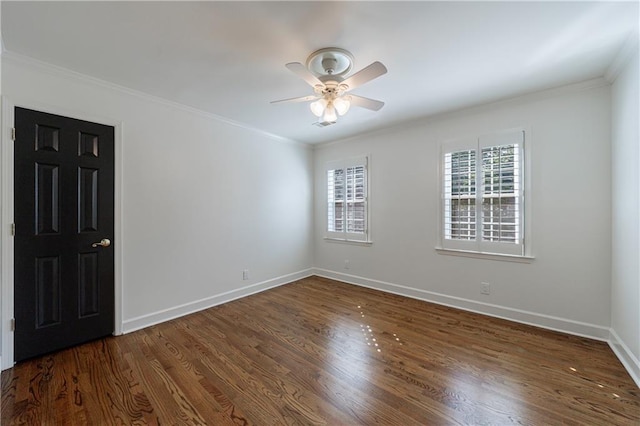 5004 Haralson Way SW, Lilburn, GA 30047 - empty room featuring ceiling fan, ornamental molding, and wood finished floors