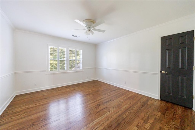 5004 Haralson Way SW, Lilburn, GA 30047 - spare room featuring ceiling fan, crown molding, and wood finished floors