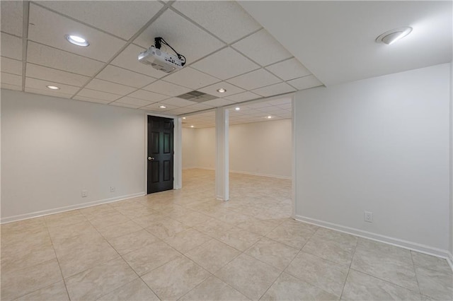 5004 Haralson Way SW, Lilburn, GA 30047 - finished below grade area with recessed lighting, light tile patterned floors, and a paneled ceiling