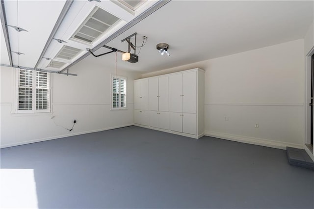 5004 Haralson Way SW, Lilburn, GA 30047 - garage featuring a garage door opener