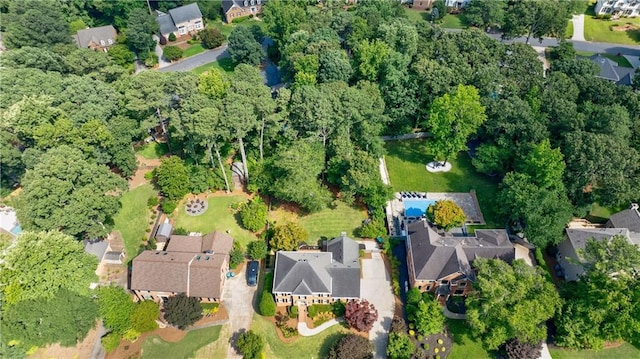 5004 Haralson Way SW, Lilburn, GA 30047 - aerial view of property and surrounding area featuring nearby suburban area