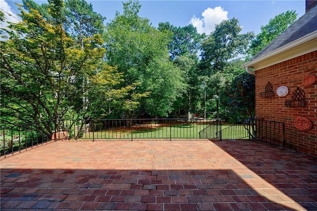5004 Haralson Way SW, Lilburn, GA 30047 - view of patio / terrace featuring view of wooded area