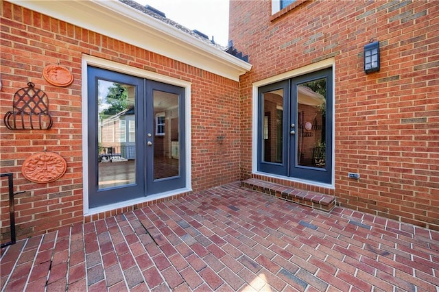 5004 Haralson Way SW, Lilburn, GA 30047 - property entrance with french doors and brick siding