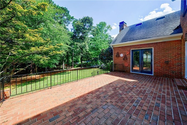 5004 Haralson Way SW, Lilburn, GA 30047 - view of patio featuring french doors
