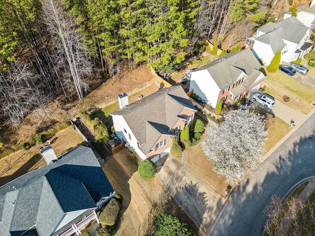 birds eye view of property with a residential view