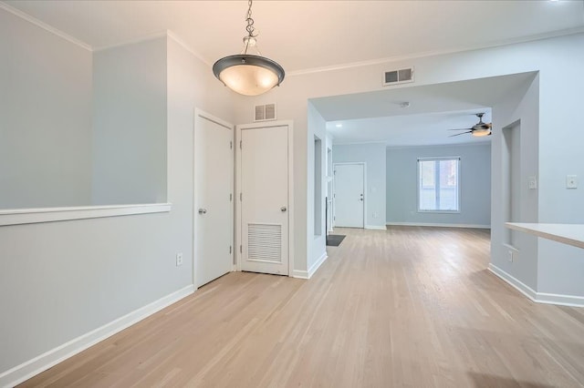 kitchen featuring a healthy amount of sunlight, light wood-type flooring, sink, and appliances with stainless steel finishes