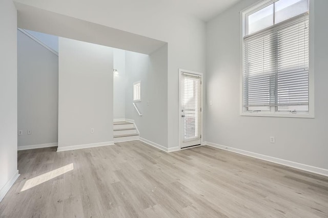 empty room with light wood-type flooring