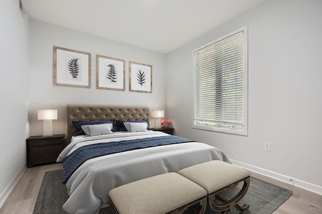 spare room featuring light wood-type flooring