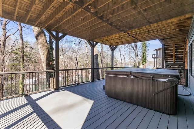 deck with a hot tub