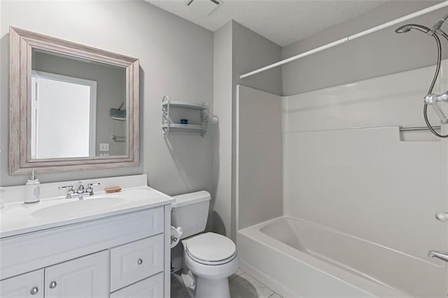 bathroom with visible vents, toilet, a textured ceiling, vanity, and shower / washtub combination