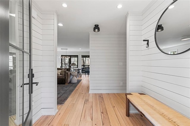 corridor with recessed lighting and light wood-style floors