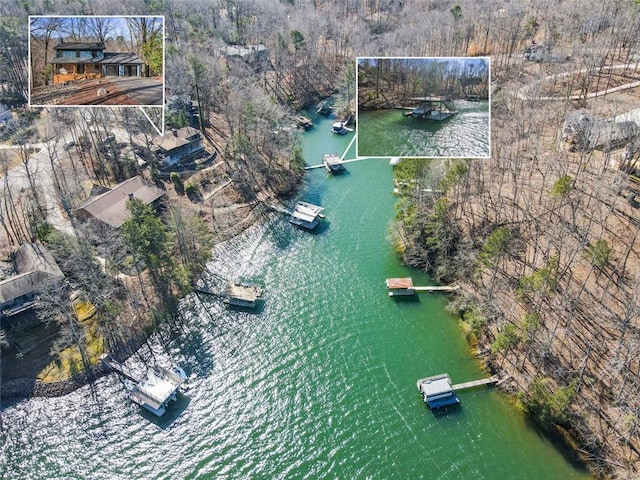 birds eye view of property featuring a water view