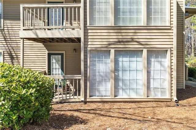 doorway to property with a balcony