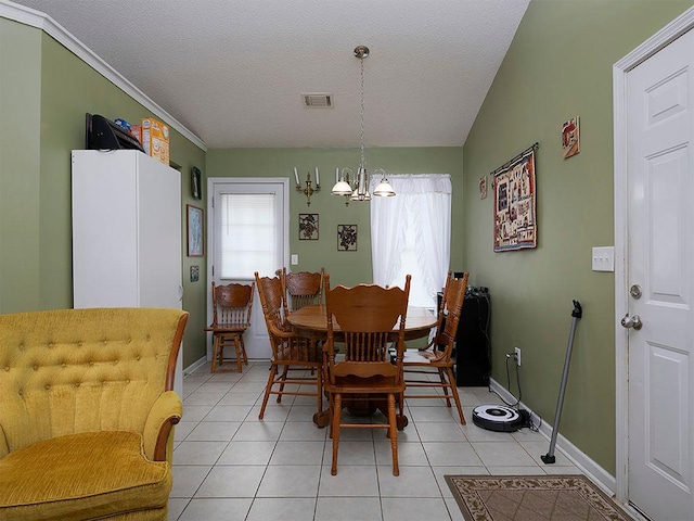 37 Montana Dr, Cedartown, GA 30125 - dining room featuring healthy amount of natural light, a chandelier, light tile patterned floors, baseboards, and a textured ceiling