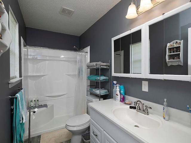 37 Montana Dr, Cedartown, GA 30125 - bathroom with vanity, a shower with shower curtain, toilet, and a textured ceiling