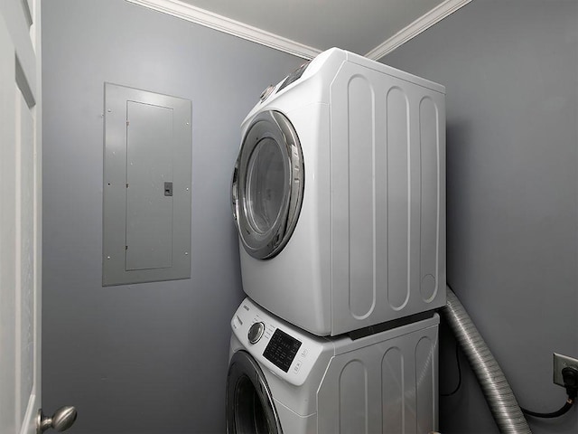 37 Montana Dr, Cedartown, GA 30125 - washroom featuring stacked washer and clothes dryer, electric panel, and ornamental molding