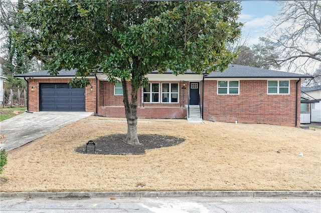 ranch-style house featuring a garage