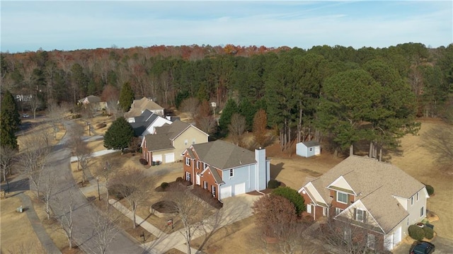 bird's eye view with a view of trees