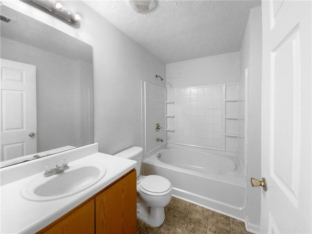 full bathroom featuring a textured ceiling,  shower combination, toilet, vanity, and tile patterned floors