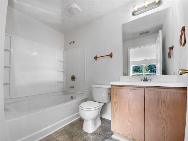 full bathroom featuring a textured ceiling, toilet, vanity, bathing tub / shower combination, and tile patterned flooring