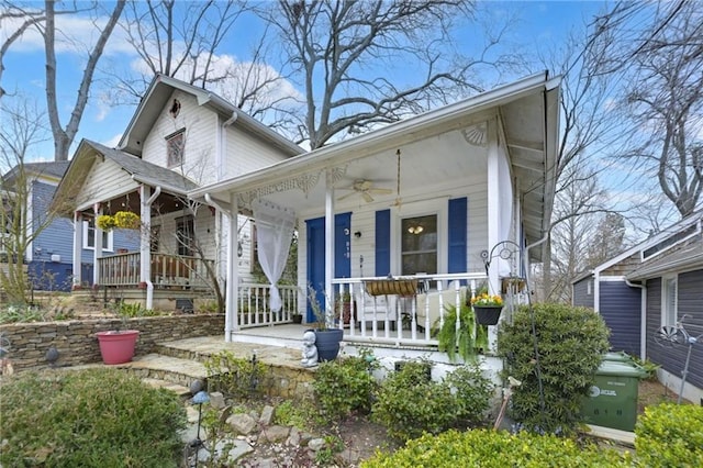 view of front of house with ceiling fan and a porch