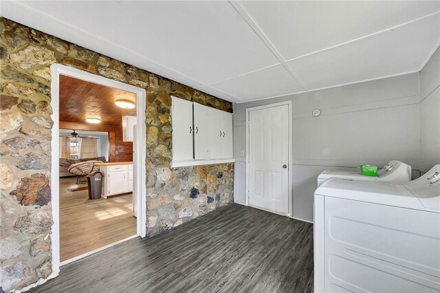 interior space featuring independent washer and dryer and wood-type flooring