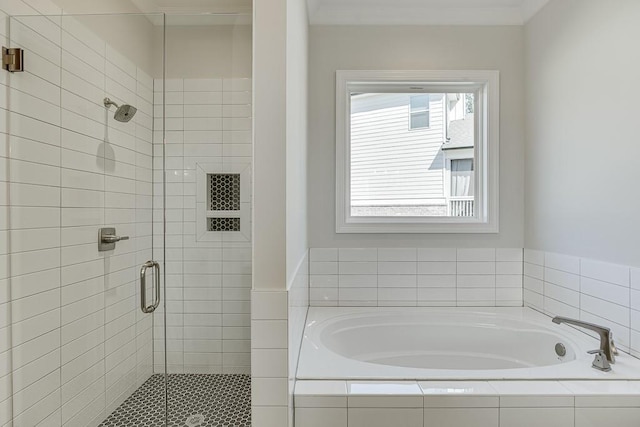 bathroom with shower with separate bathtub