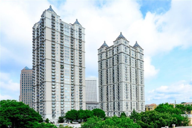 view of property with a city view