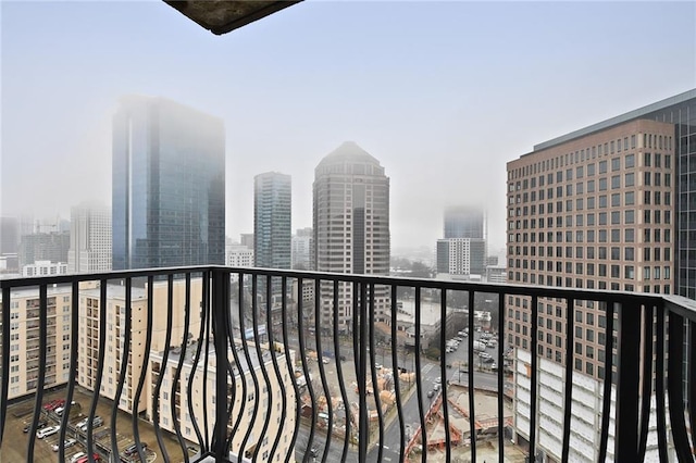 balcony featuring a view of city