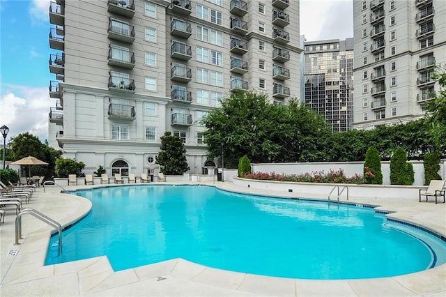 pool with a patio