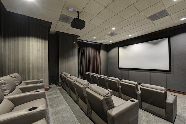 carpeted cinema room featuring baseboards, recessed lighting, and a paneled ceiling