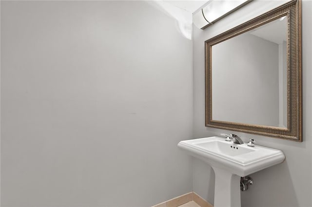 bathroom featuring baseboards