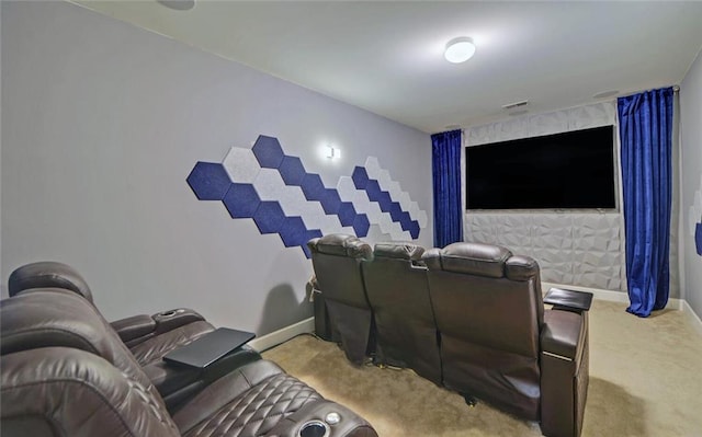 carpeted cinema room with baseboards