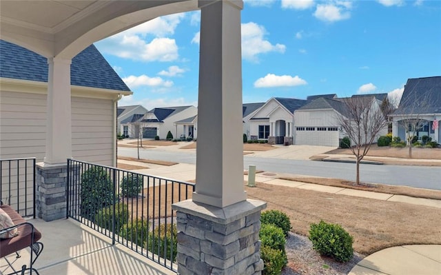 exterior space with a residential view and covered porch