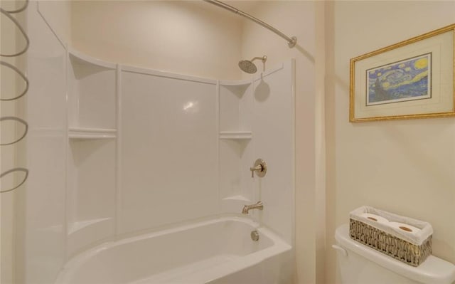 full bathroom with bathing tub / shower combination and toilet