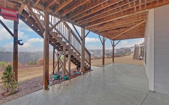 view of patio featuring stairs