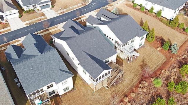 birds eye view of property with a residential view