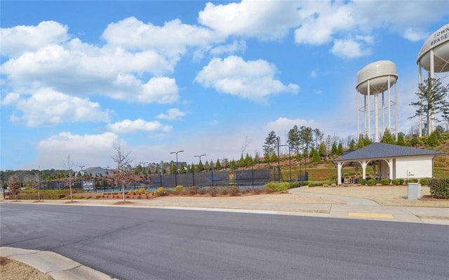 view of road featuring sidewalks and curbs