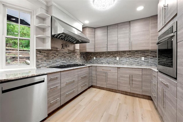 2828 Cloverhurst Dr, Atlanta, GA 30344 - kitchen with appliances with stainless steel finishes, gray cabinetry, wall chimney range hood, ornamental molding, and recessed lighting